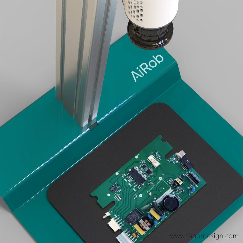 Pole odczytu statywu do prezentacji kamery kontrolującej układy elektroniczne. Na polu płytka PCB z podzespołami.